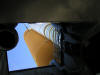 Columbia main fuel tank and solid rocket booster from below the gantry